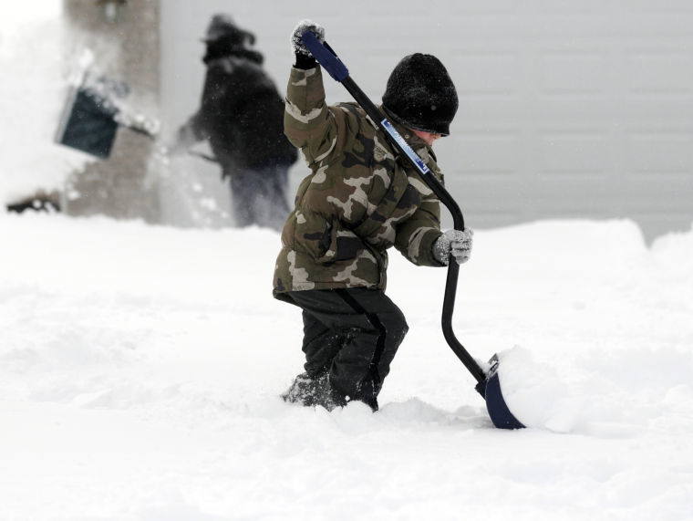 Strangers unite to help each other shovel out after big storm
